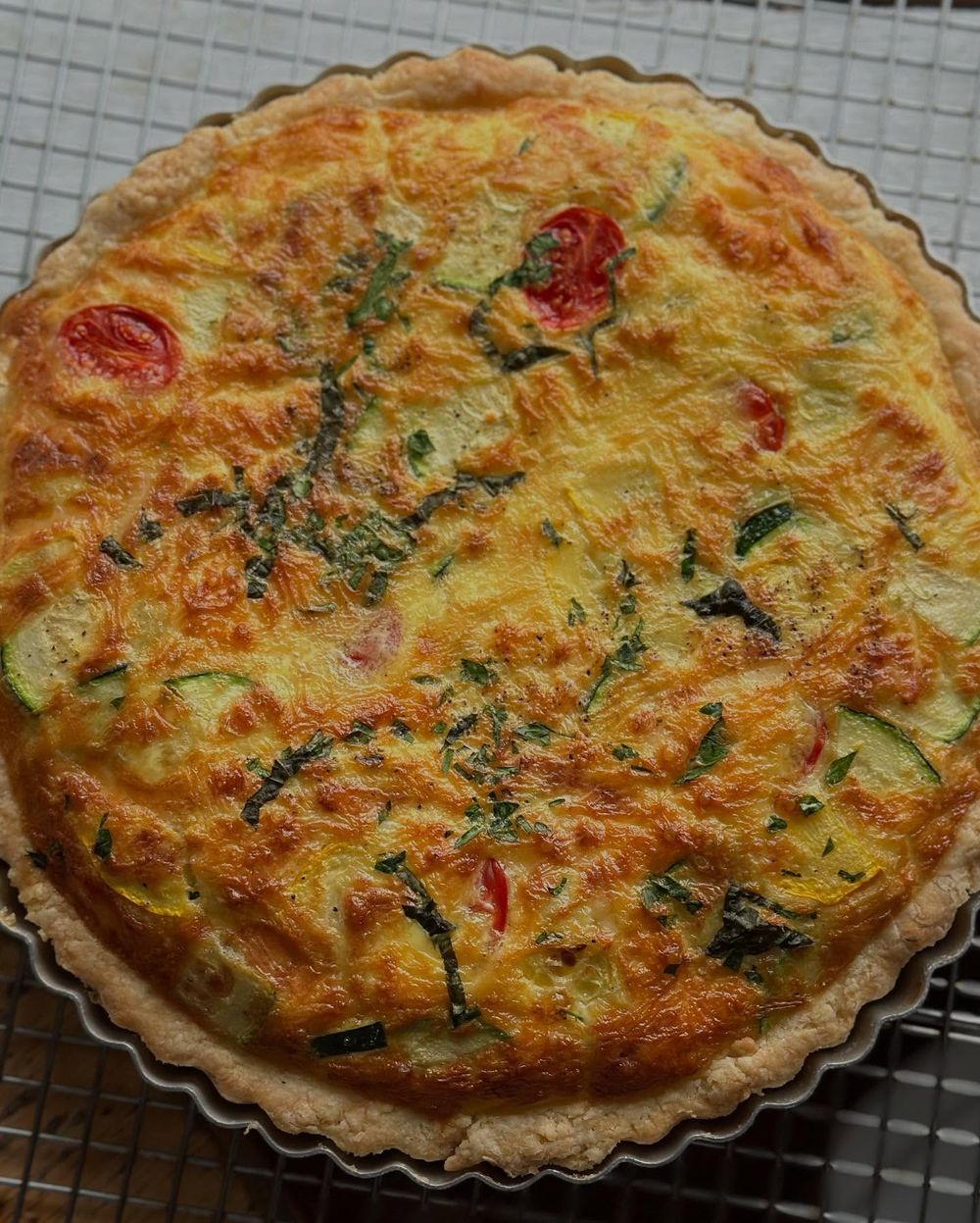 Asiago quiche with tomato and zucchini