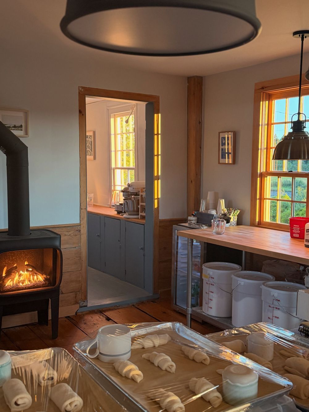 Inside the farmhouse: wood stove and pastry counter